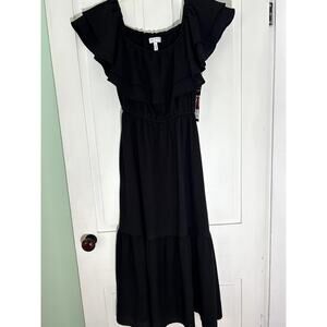 NEW WITH TAGS.‎ Black Ruffle dress.
